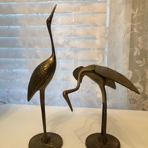 Pair of gorgeous mid century solid brass cranes.